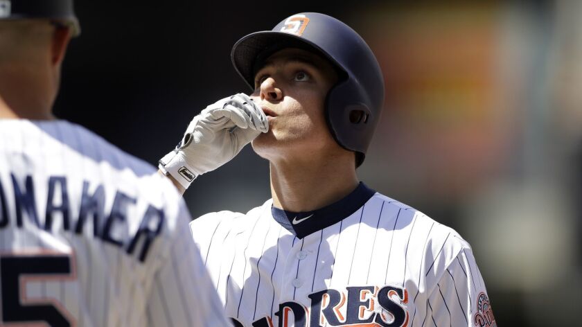 Luis Urias reacts after hitting a single, the first hit of his major league career, during the third inning of Wednesday's victory over the Seattle Mariners.
