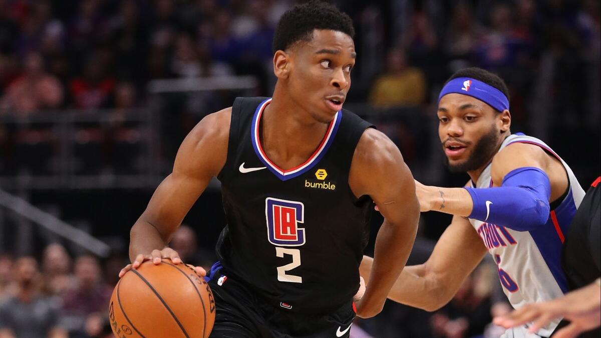 Clippers' Shai Gilgeous-Alexander drives past Detroit's Bruce Brown on Feb. 2.