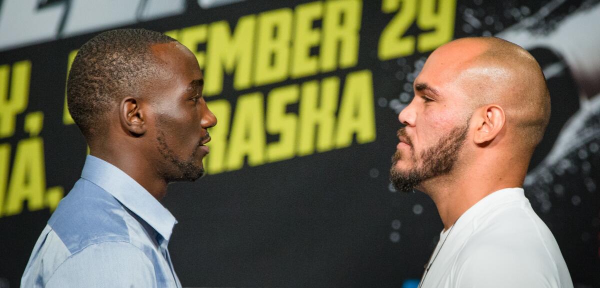 Terence Crawford (24-0, 17 knockouts), left, will defend his World Boxing Organization lightweight title against Ray Beltran (29-6-1, 17 KOs) in Omaha, Neb., on Saturday.