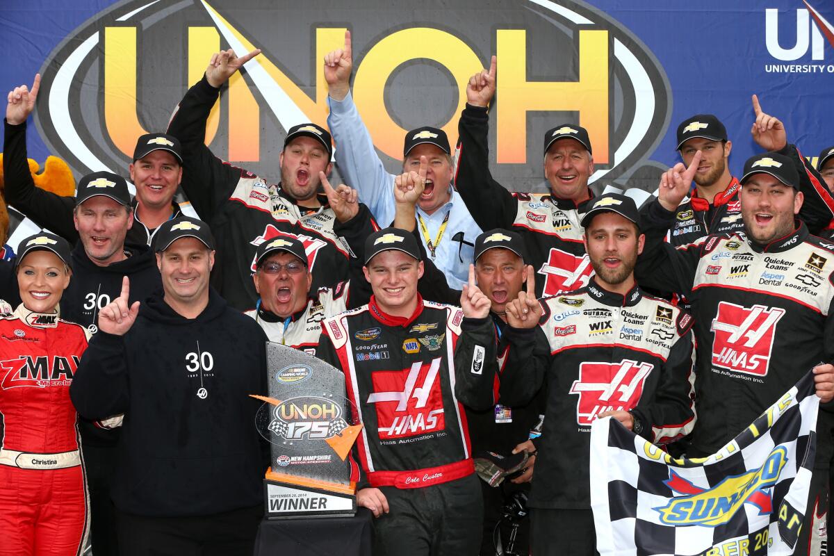 Cole Custer celebrates in victory lane after winning the NASCAR Camping World Truck Series race at New Hampshire Motor Speedway on Sept. 20, 2014.