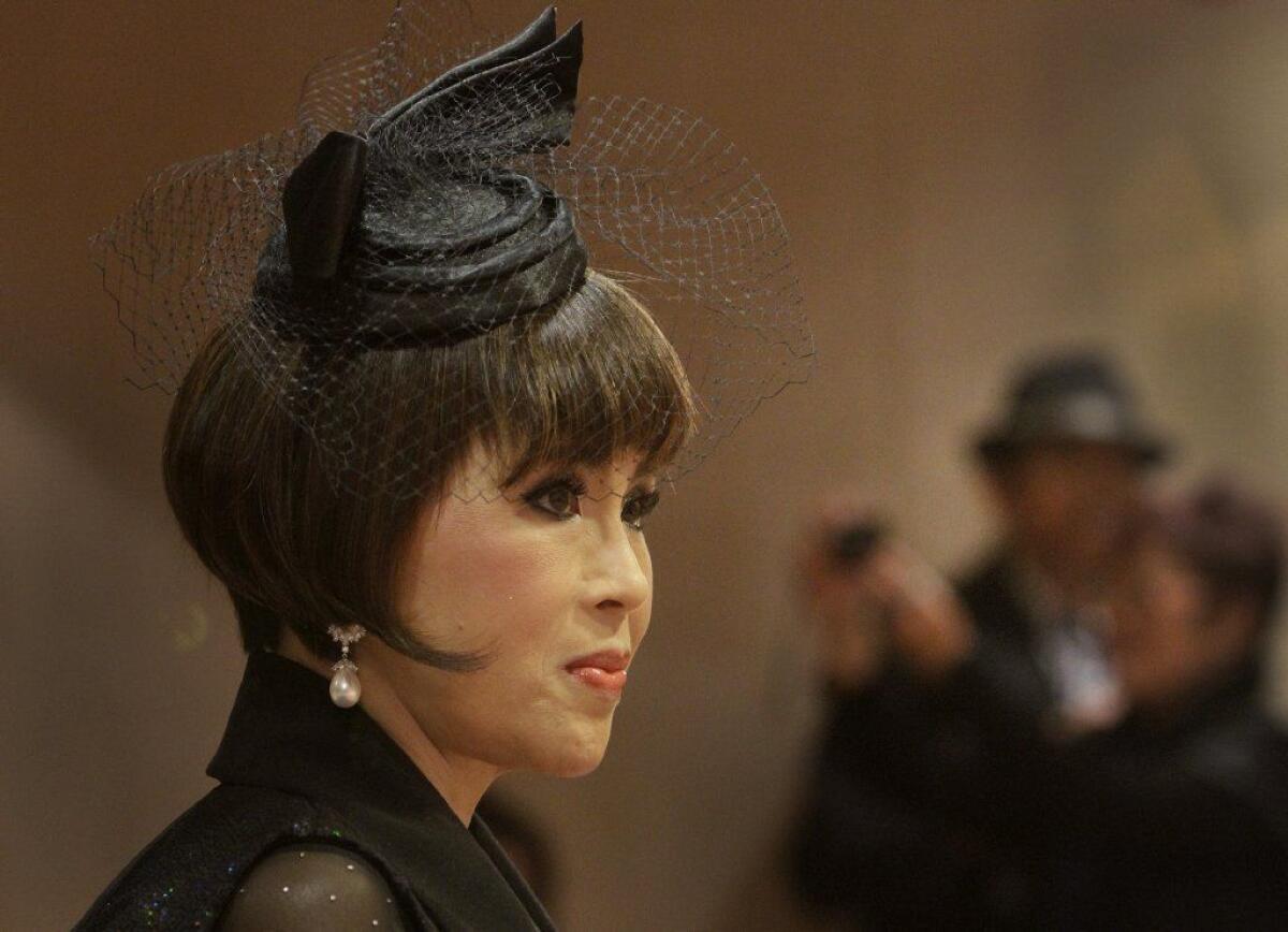 Thai Princess Ubolratana Mahidol, shown in a 2013 appearance in Santa Monica to promote Thailand as a filming destination, was not in the Constitutional Court for Thursday's hearing on the dissolution of the party that nominated her for prime minister.