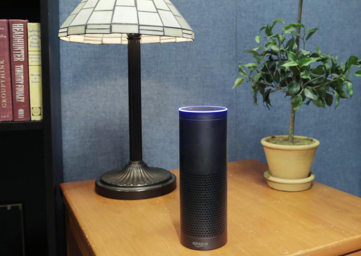 This 2015 file photo shows Amazon's Echo -- a device facing big competition from Google this holiday season.