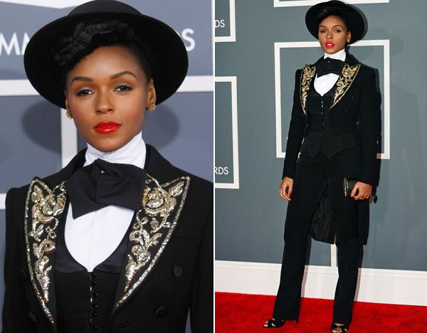 Janelle Monae worked her signature androgynous look in a tux jacket with sparkly lapels, a dripping bow tie and a flat top hat. She told E!, "I'm wearing ideas," and credited her stylist Erin Hirsh for putting it all together.