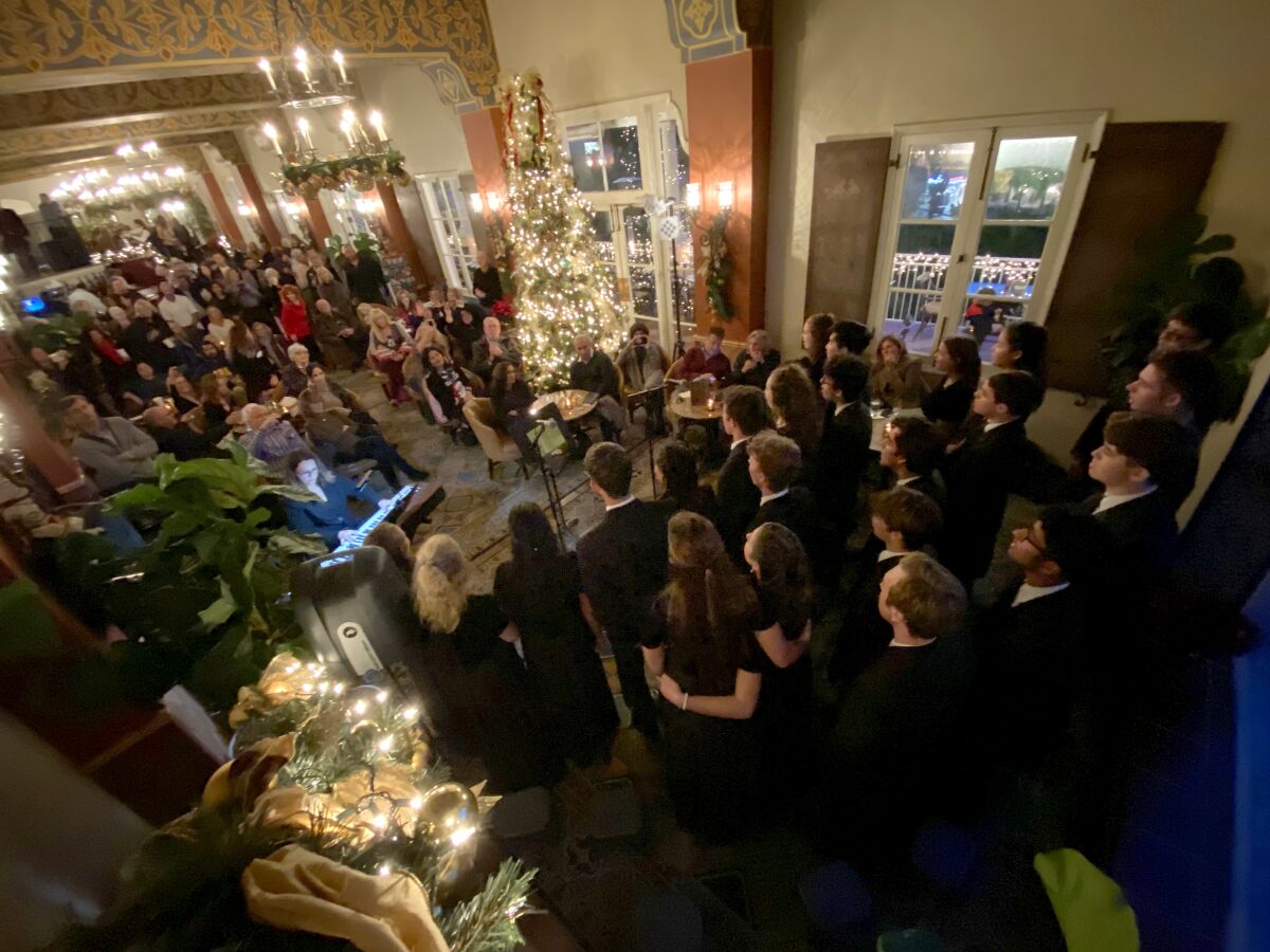 La Jolla Country Day School’s Madrigal Singers perform at La Valencia Hotel’s Christmas tree-lighting ceremony Dec. 5.