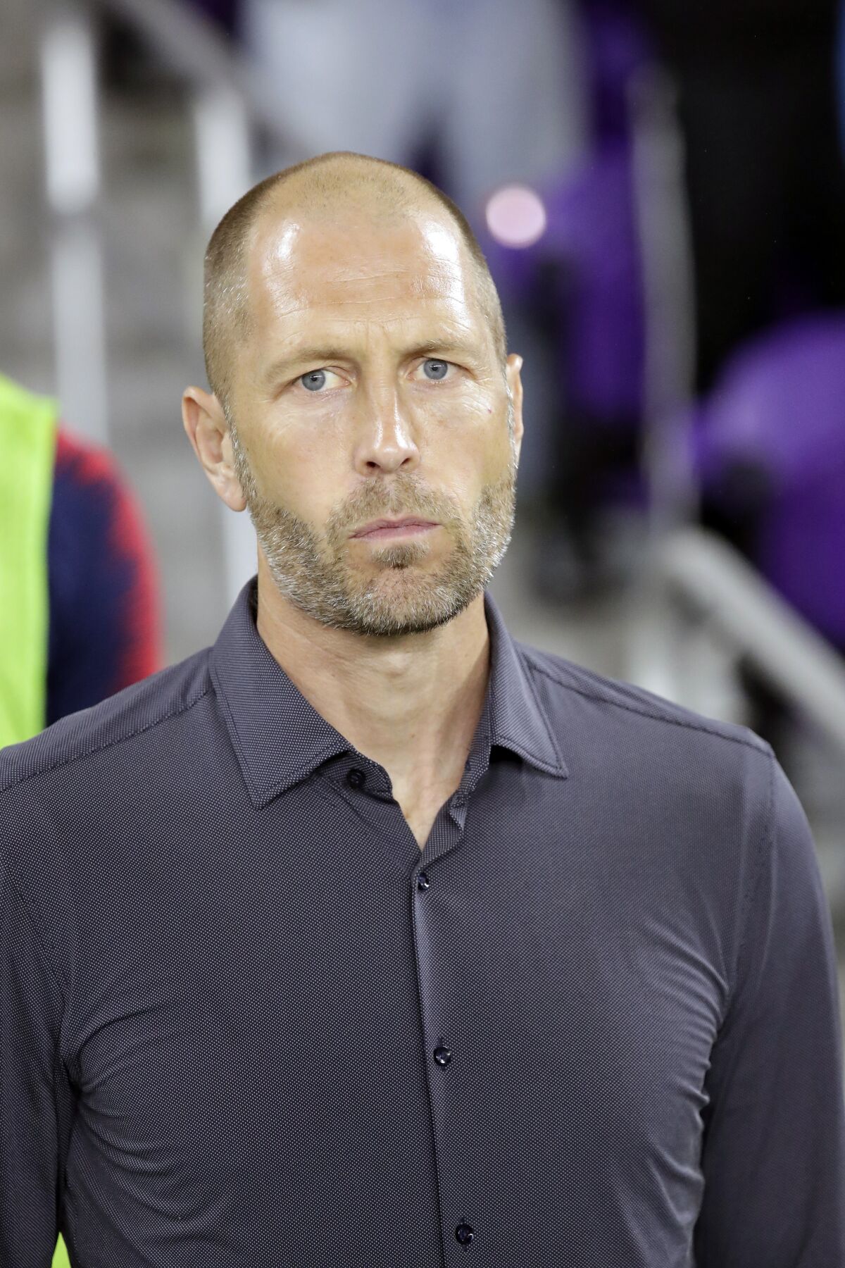 U.S. coach Gregg Berhalter stands during the national anthem before Friday night's game.