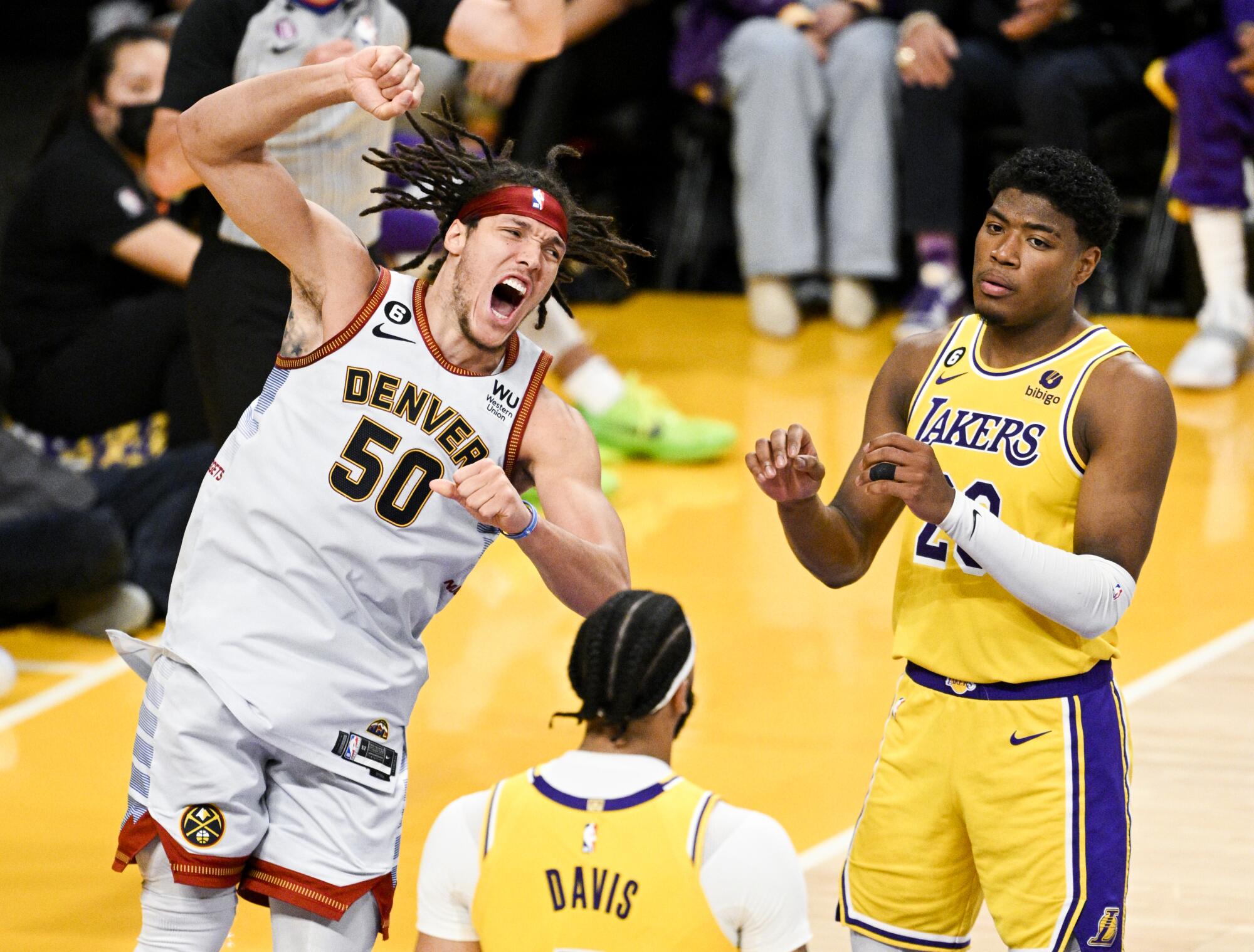 Nuggets forward Aaron Gordon reacts after being fouled by Lakers guard Austin Reaves on a dunk.