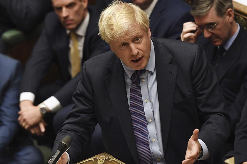 British Prime Minister Boris Johnson speaks in the House of Commons in London on Tuesday.