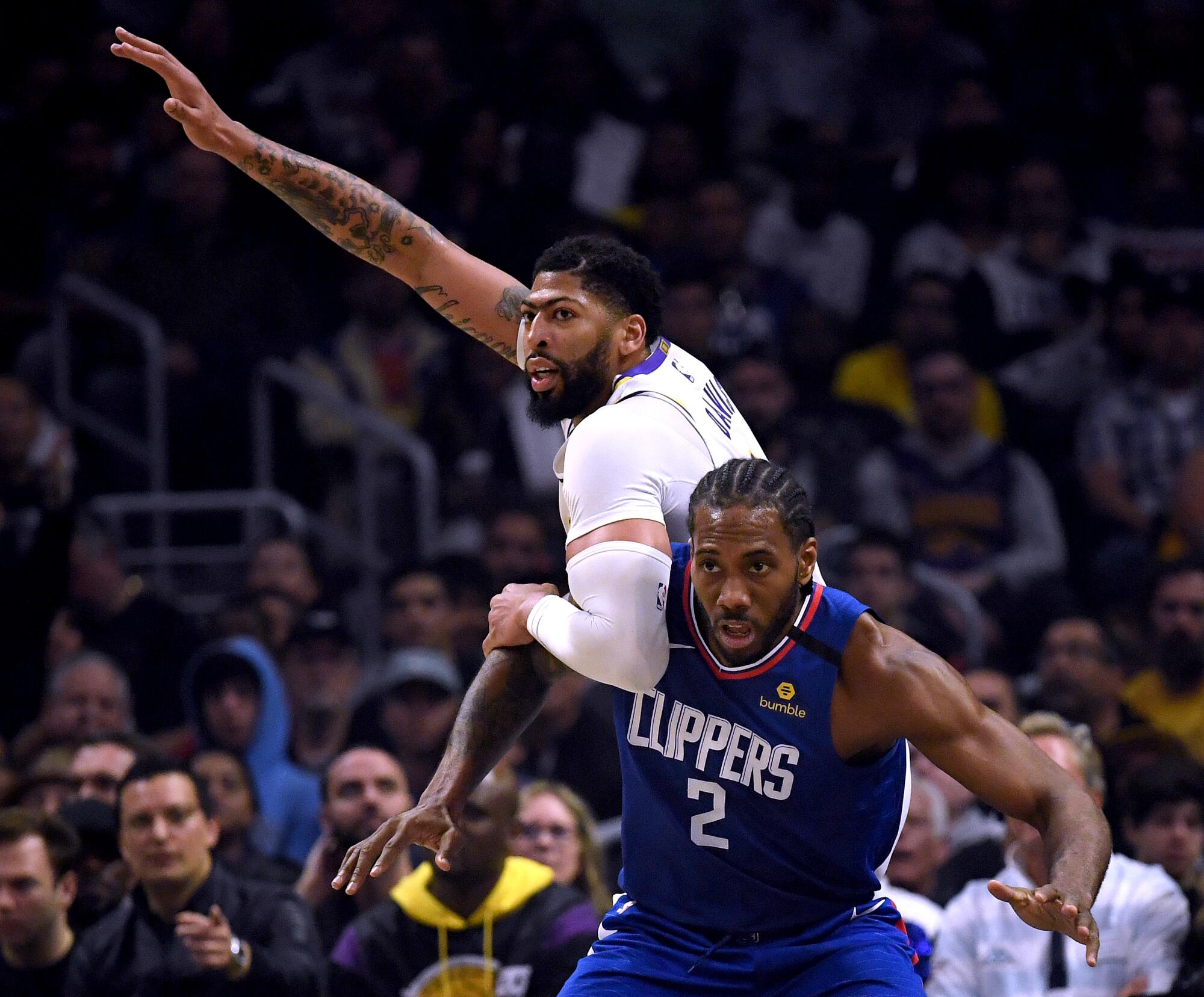 Clippers; Kawhi Leonard guards Lakers' Anthony Davis on March 8 at Staples Center.