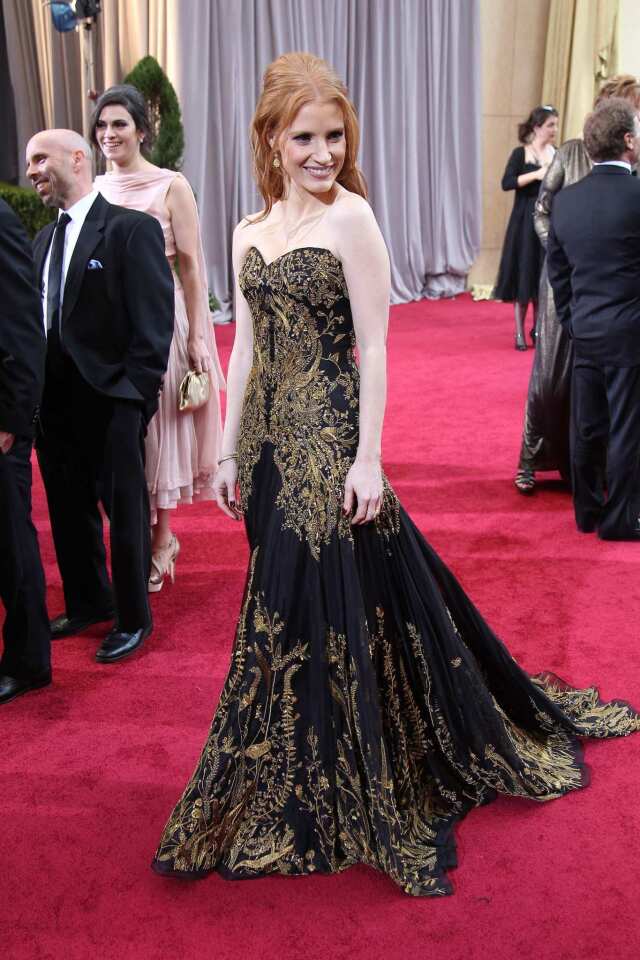 Jessica Chastain's gold-embroidered black Alexander McQueen gown was too somber and serious for the event. And it seemed to weigh her down.
