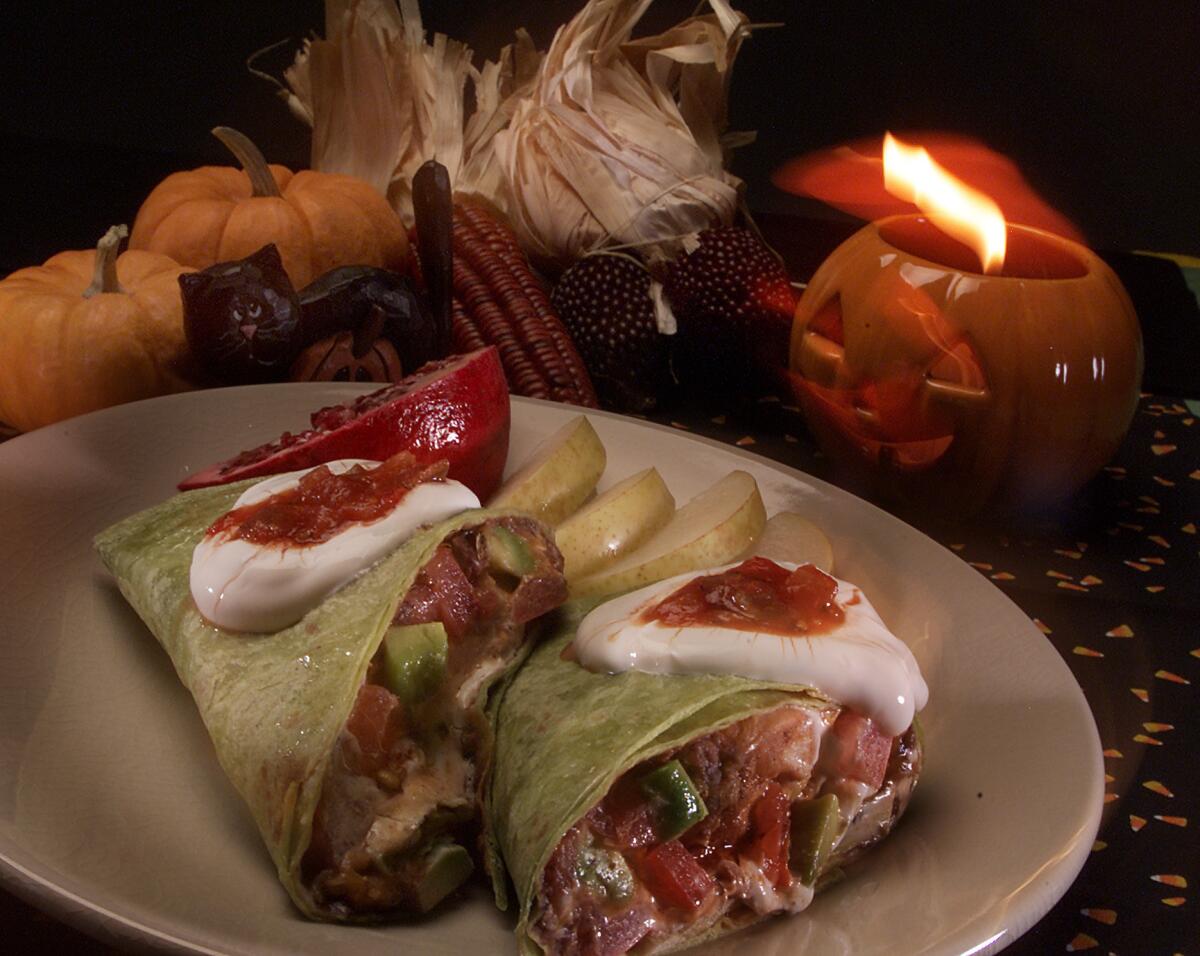 These tasty chicken burritos are wrapped in green tortillas and are ample fortification before an evening of trick-or-treating.