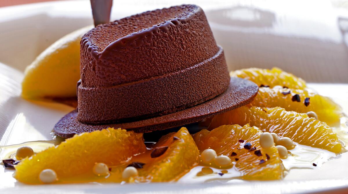 A rich, dark chocolate mousse, molded in the shape of a fedora, is the signature dessert at Sinatra, a restaurant inside the Encore resort. It resembles the hat Sinatra typically wore.