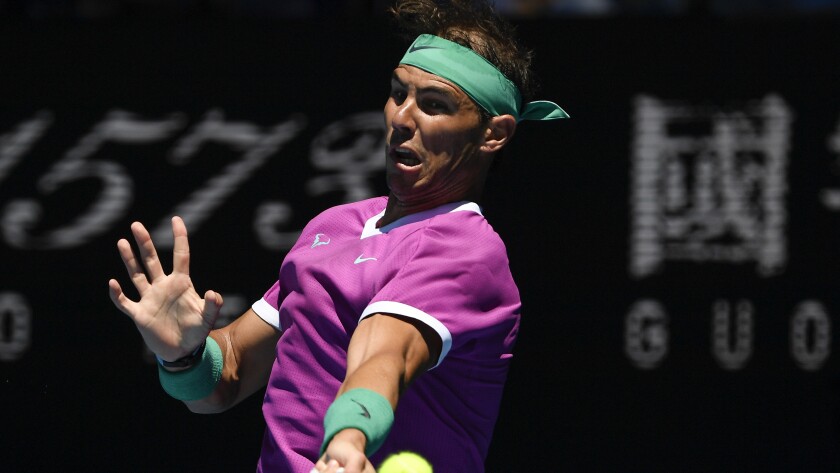 Rafael Nadal of Spain plays a forehand 