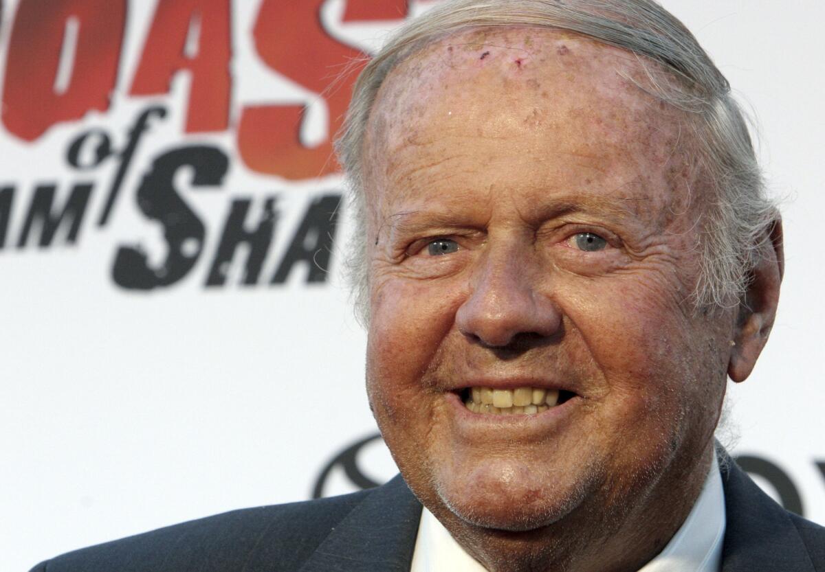 FILE - In this Aug. 13, 2006 file photo, actor Dick Van Patten poses for photographers on the red carpet before Comedy Central's "Roast of William Shatner," in Los Angeles. Van Patten, the genial comic actor best known as the patriarch of TV's "Eight is Enough," died of complications from diabetes on Tuesday, June 23, 2015, in Santa Monica, Calif., according to his publicist Daniel Bernstein. He was 86. (AP Photo/Rene Macura, File)