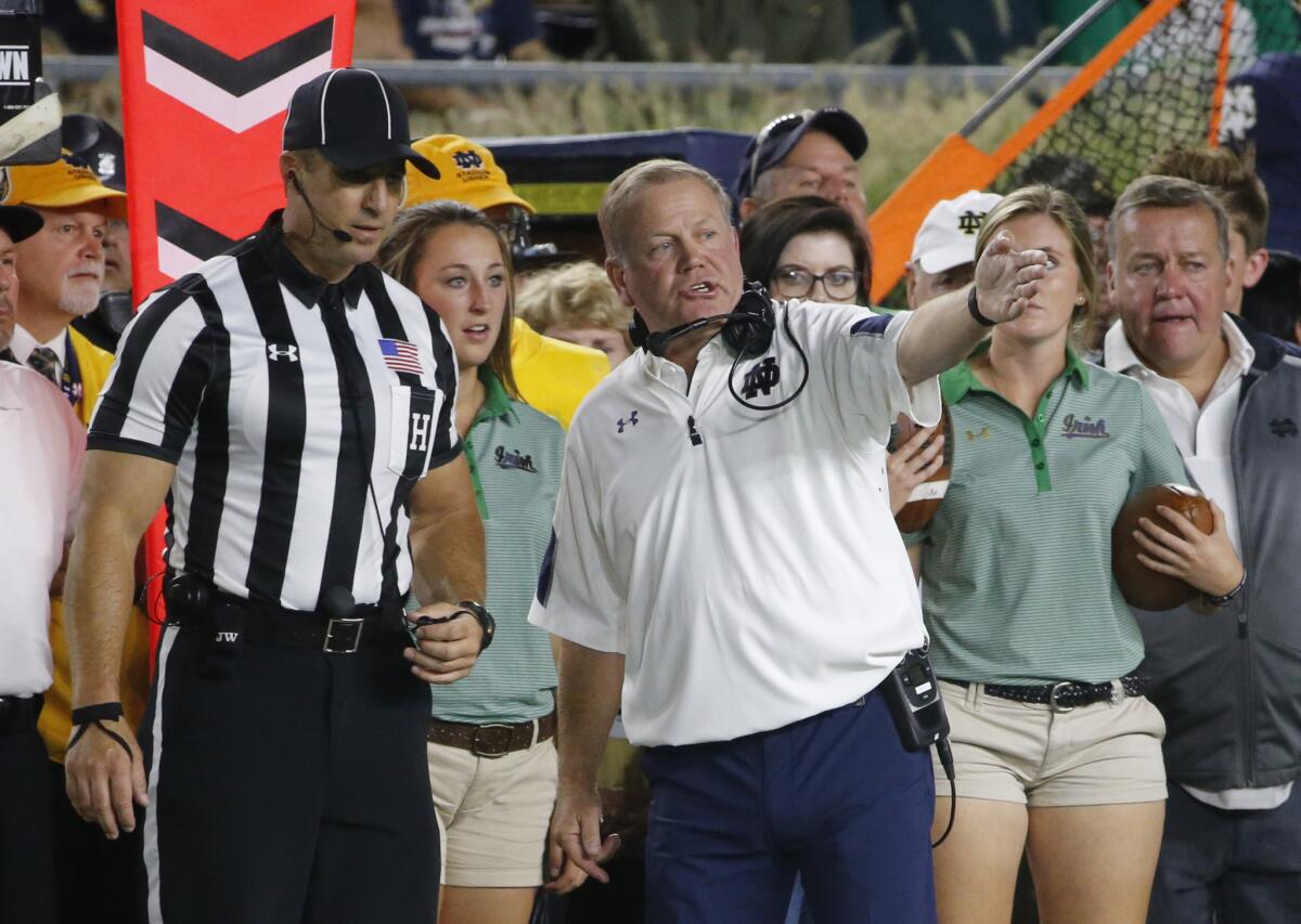 Notre Dame Coach Brian Kelly tries to reason with an official on the sideline on Sept. 17.