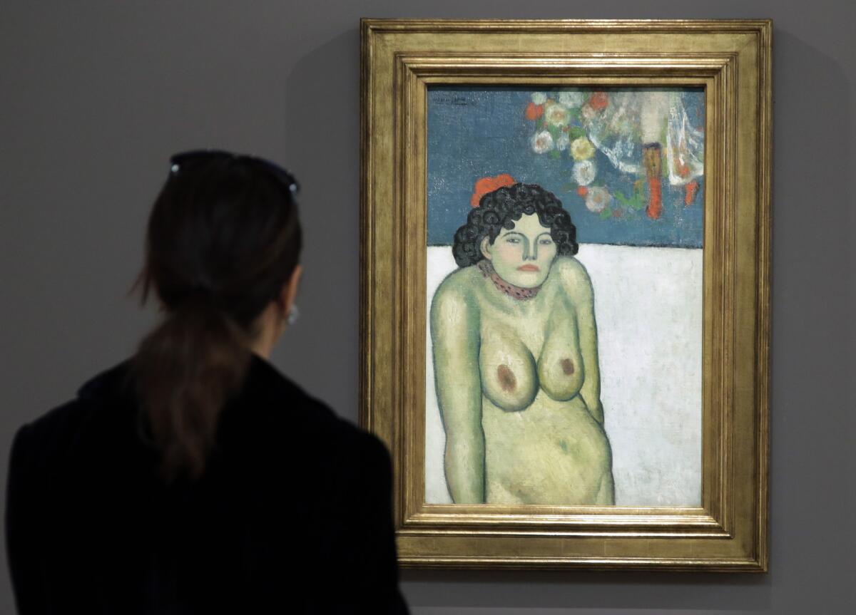 Esta fotografía de archivo del 30 de octubre de 2015 muestra la pintura "La Gommeuse”, obra realizada en 1901 durante el Período Azul del pintor español Pablo Picasso, en la casa de subastas Sotheby's, en Nueva York.