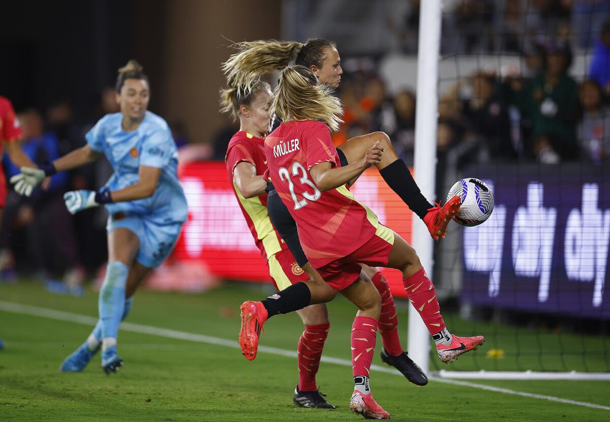 Angel City's Claire Emslie scores in the 76th minute of a 2-2 draw with Portland at BMO Stadium.