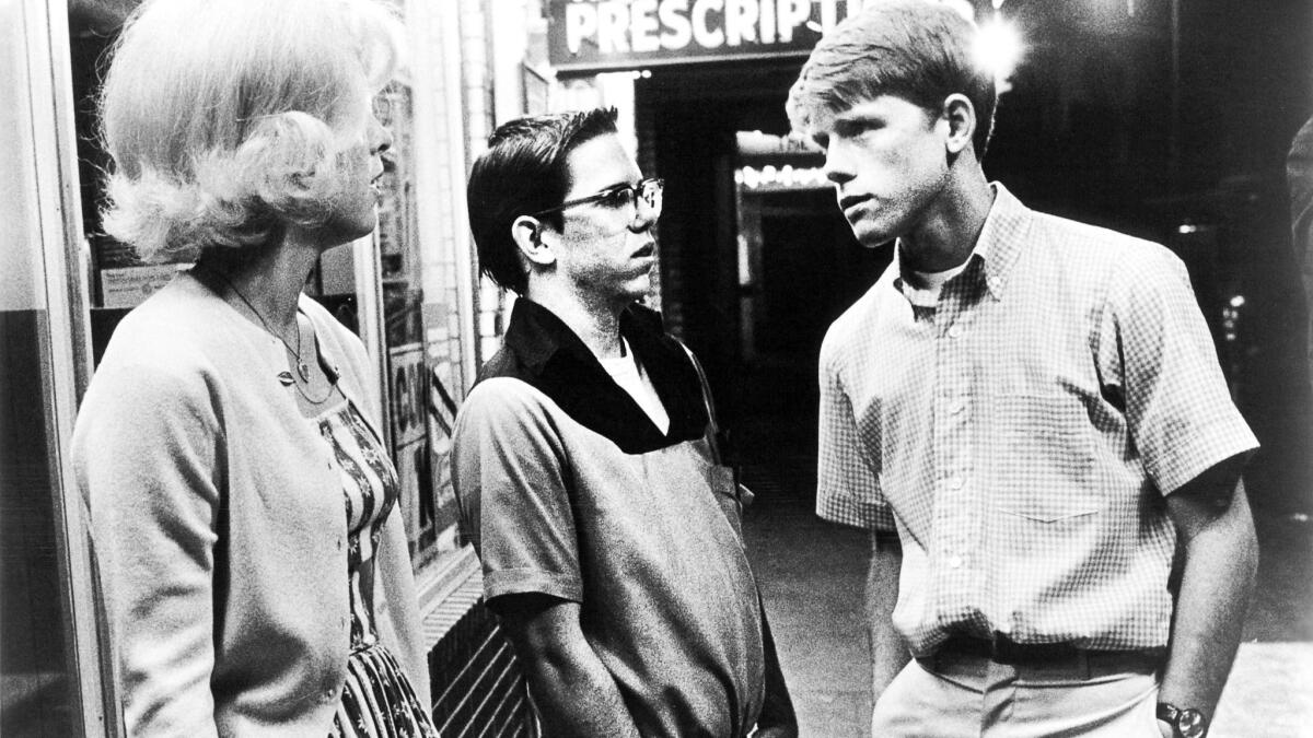 Candy Clark, left, Charles Martin Smith and Ron Howard in a scene from the 1973 film "American Graffiti."