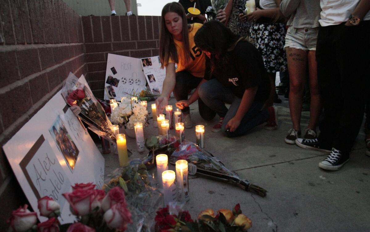 Candles and notes at Capistrano Valley High School in Mission Viejo bear witness to the community's grief over the loss of 5 teens. The teens had left Knott's Berry Farm when their car drifted off the southbound lanes of the 5 Freeway in Irvine.