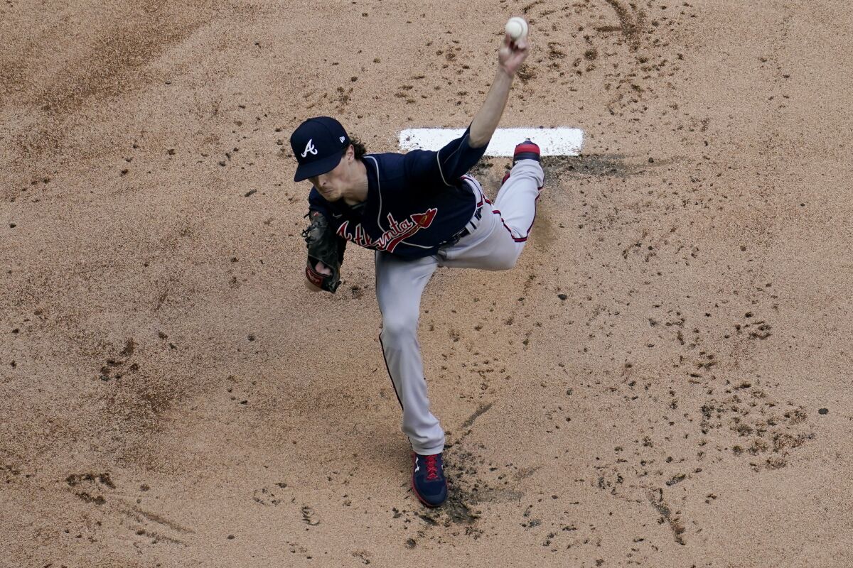 Atlanta Braves starting pitcher Max Fried throws against the Dodgers in the first inning.