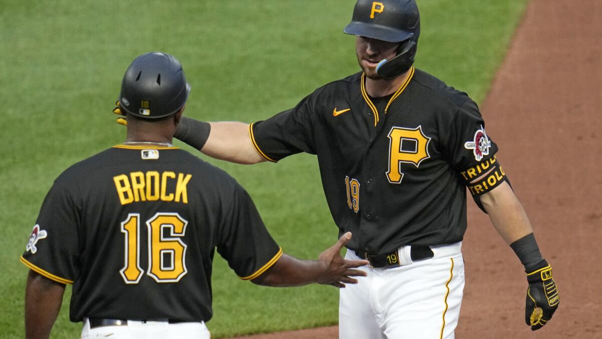 Delay's 2-run double in 6-run 7th sparks Pirates over Mets 7-4