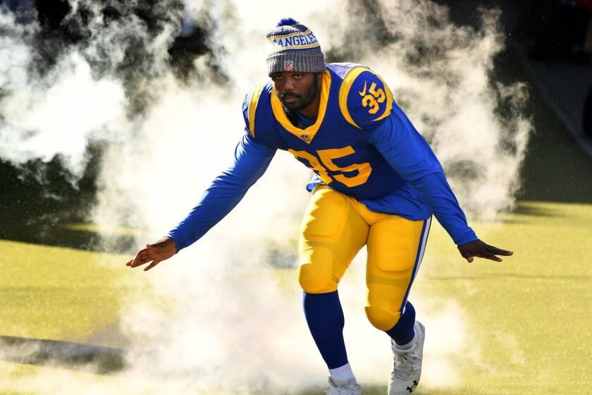 LOS ANGELES, CALIFORNIA DECEMBER 30, 2018-Rams running back C.J. Anderson is introduced before a game with the 49ers at the Coliseum. (Wally Skalij/Los Angeles Times)