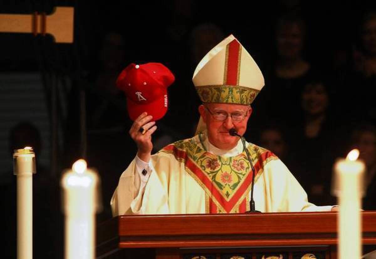 Bishop Kevin Vann likes his hats; he wears fedoras, berets and even an  Angels baseball cap – Orange County Register