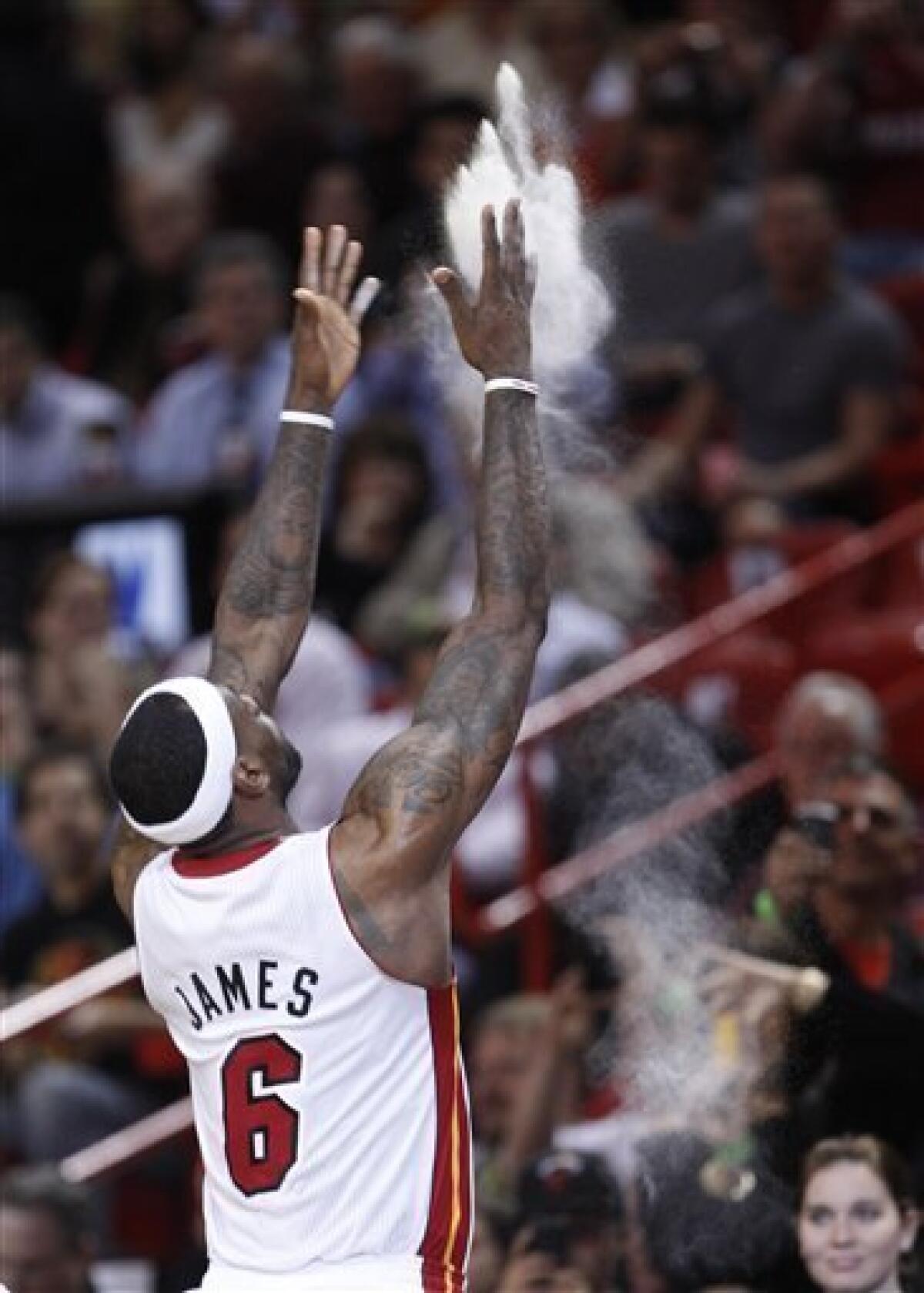Goin' to Miami LeBron James ends circus, says he's joining Wade