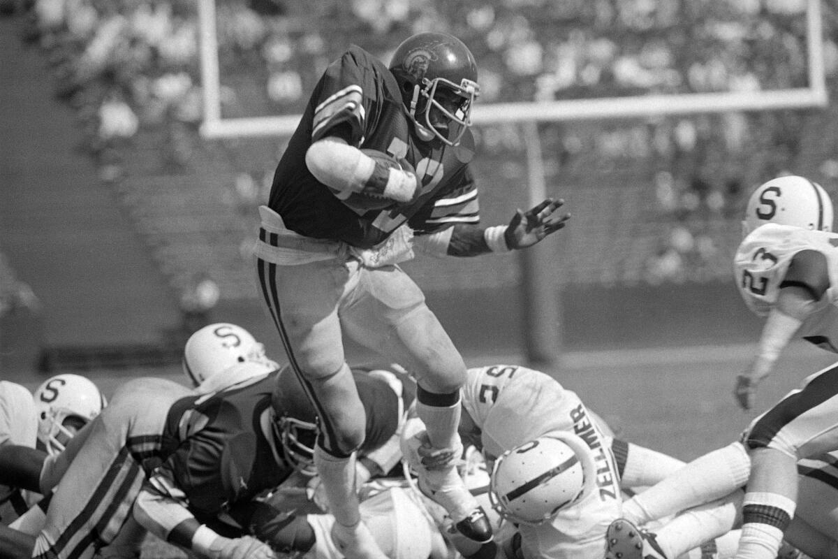 USC tailback Charles White runs against Stanford on Oct. 13, 1979, in Los Angeles. 