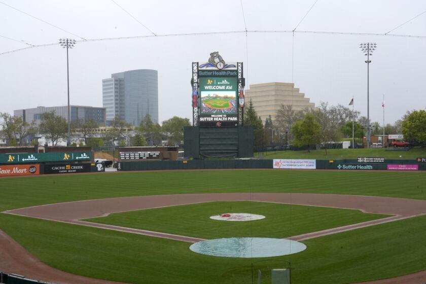 FILE - Sutter Health Park is shown in West Sacramento, Calif., Thursday, April 4, 2024. The new artificial turf surface at the Oakland Athletics' temporary home in Sacramento, California, will have a hydration element because of summer heat at the open-air ballpark. “We think that’s the best that we can do in terms of playing surface in the heat.” baseball Commissioner Rob Manfred said Tuesday, July 16, 2024.(AP Photo/Rich Pedroncelli, File)