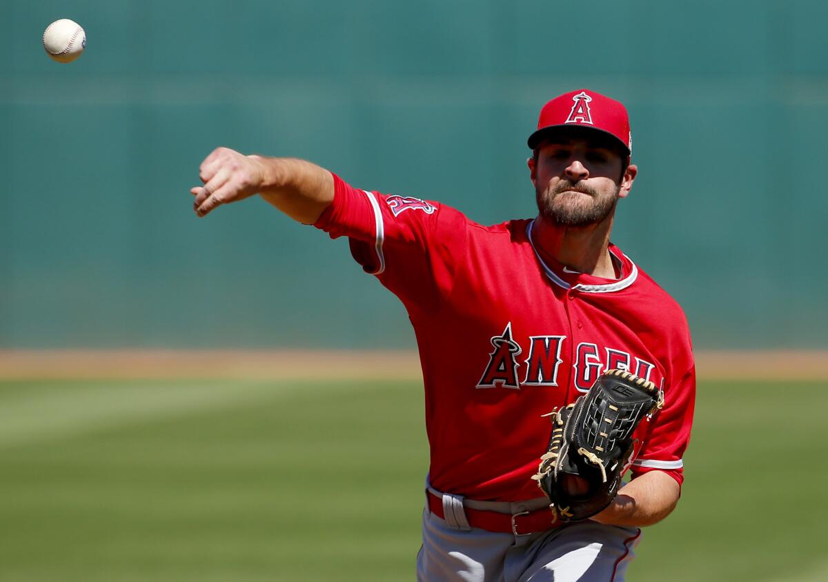 Angels pitcher Nick Tropeano warms up in between innings against the Indians during a spring training game on March 16.
