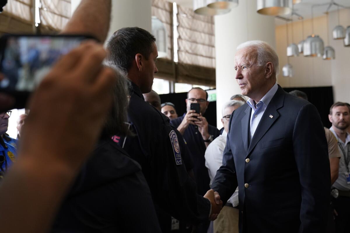 President Biden meets with first responders in Miami Thursday, following last week's condo tower collapse.