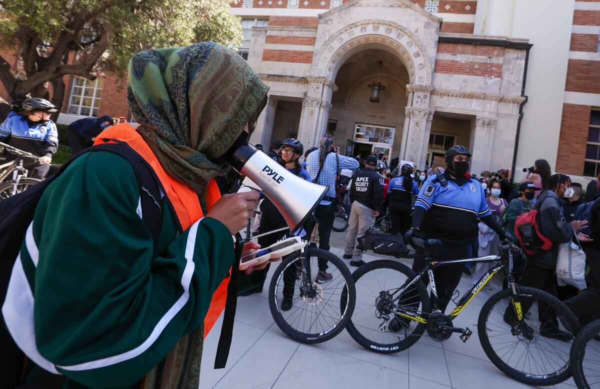 Pro-Palestinian supporters demonstrate in front of Dodd Hall after arrests at UCLA on Monday, May 6.