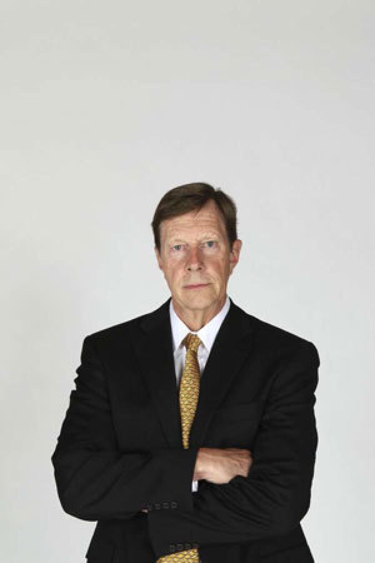David Poile, shown in a file photo, was injured when a puck hit him in the face Thursday in St. Paul, Minn.