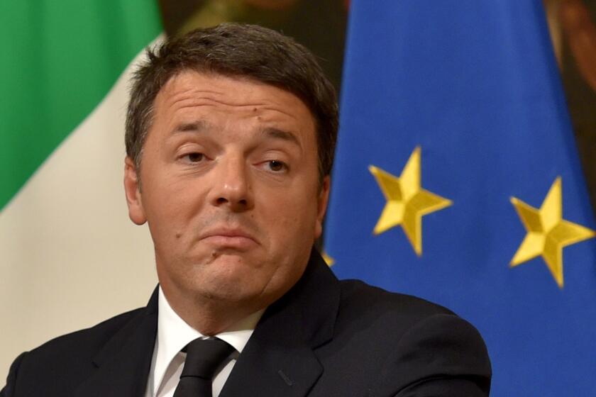 Italy's Prime Minister Matteo Renzi announces his resignation during a news conference at the Palazzo Chigi in Rome after the defeat of a referendum on constitutional reforms on Dec. 4, 2016.