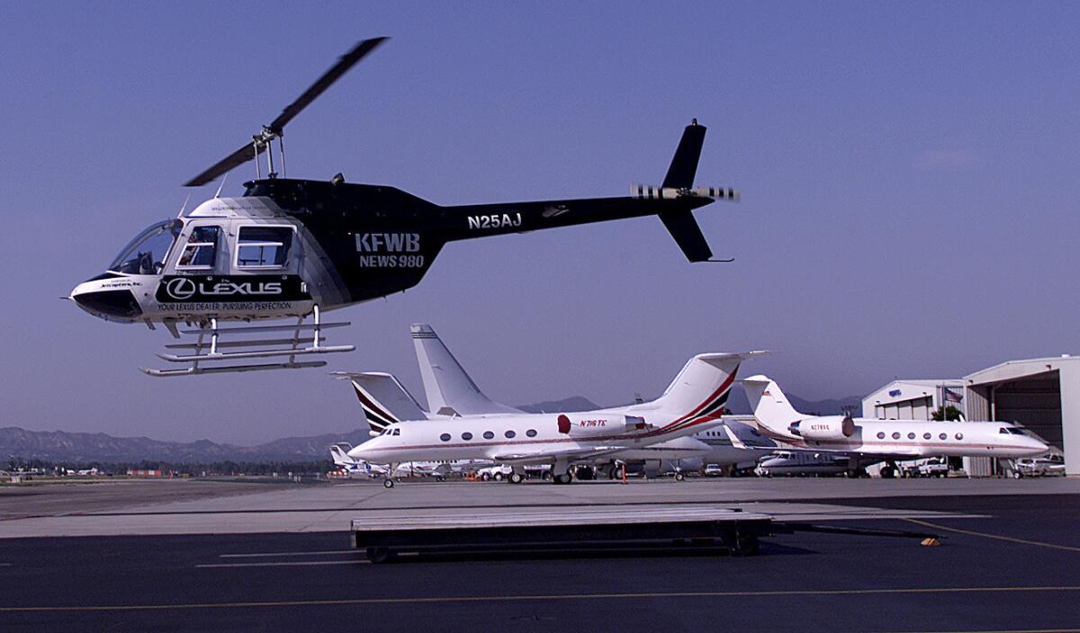 A news helicopter takes off from Van Nuys Airport. Such choppers would be effected by new federal legislation sent Thursday to President Obama for his signature.
