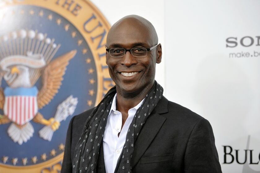 FILE - Actor Lance Reddick appears at the "White House Down" premiere in New York on June 25, 2013. Reddick, a character actor who specialized in intense, icy and possibly sinister authority figures on TV and film, including “The Wire,” @Fringe” and the “John Wick” franchise, died suddenly on Friday, March 17, 2023. He was 60. (Photo by Evan Agostini/Invision/AP, File)