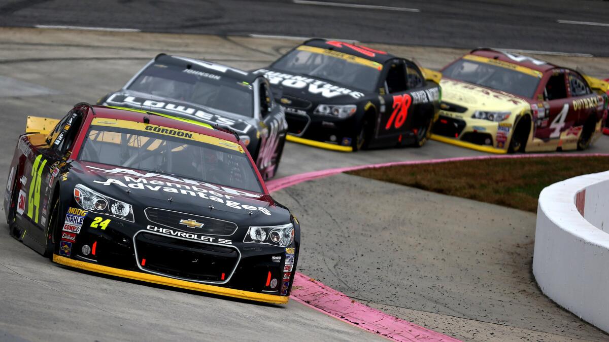 NASCAR driver Jeff Gordon leads the pack during the Sprint Cup Series race at Martinsville Speedway on Sunday.