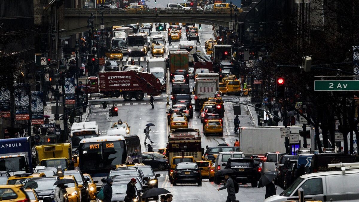 A task force has outlined a plan to charge drivers a toll to enter Manhattan in an effort to reduce congestion and raise funds for transit improvements.