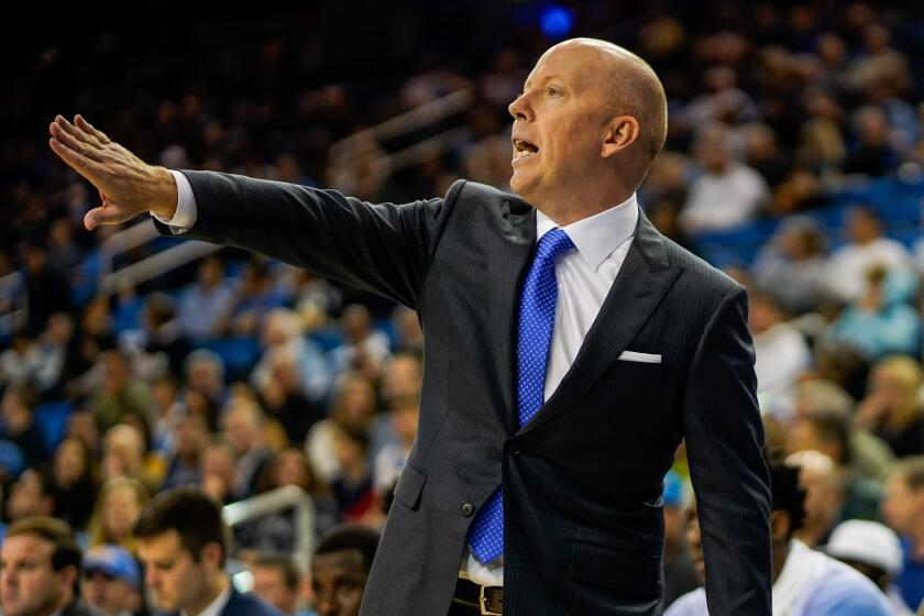 LOS ANGELES, CALIF. - NOVEMBER 06: UCLA Bruins head coach Mick Cronin gestures while shouting to players during the first half of a NCAA basketball game between the UCLA Bruins and the Long Beach State 49ers at UCLA Pauley Pavillion on Wednesday, Nov. 6, 2019 in Los Angeles, Calif. (Kent Nishimura / Los Angeles Times)