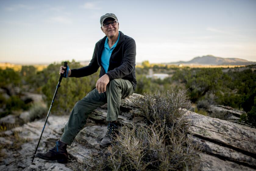 Randy Merrell poses for a portrait while taking one of his most frequented hikes Sunday, Sept. 22, 2019, near his home just outside of Vernal, Utah. (Isaac Hale / For The Times)