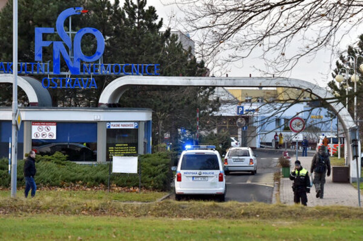 Police arrive at a hospital in Ostava, Czech Republic, after a shooting Dec. 10.