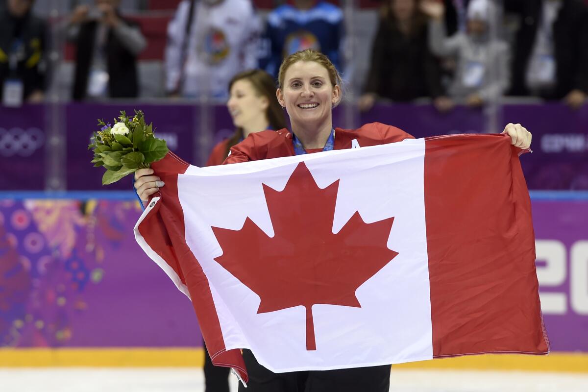 Hayley Wickenheiser celebrates Canada's victory over the United States in the gold medal game at the 2014 Sochi Winter Olympics.