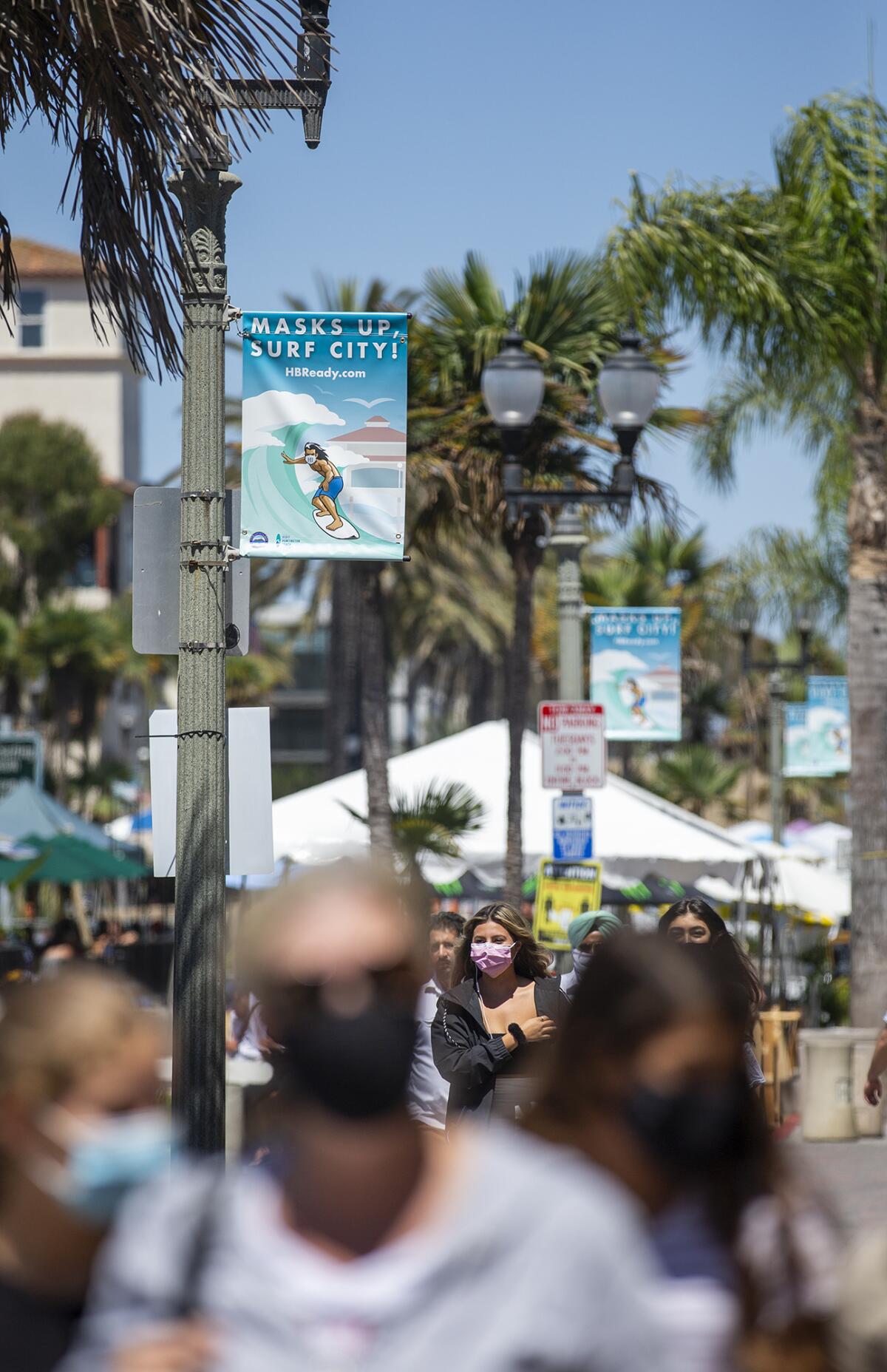 "Masks Up, Surf City" is a city-run campaign to encourage people to wear masks while out and about. 