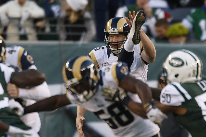 All-Pro Johnny Hekker punts for the Rams during a game against the New York Jets on Nov. 13.