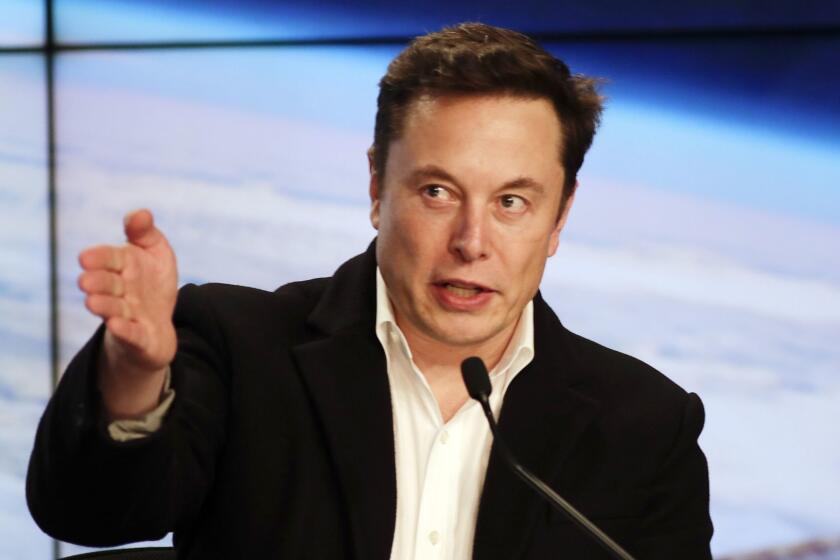 Elon Musk, CEO of SpaceX, speaks during a news conference after the SpaceX Falcon 9 Demo-1 launch at the Kennedy Space Center in Cape Canaveral, Fla., Saturday, March 2, 2019. (AP Photo/John Raoux)