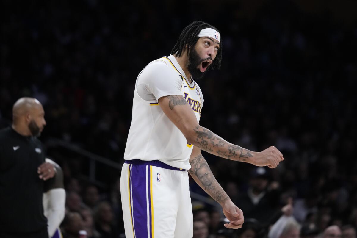 Lakers forward Anthony Davis reacts to a foul called against him.