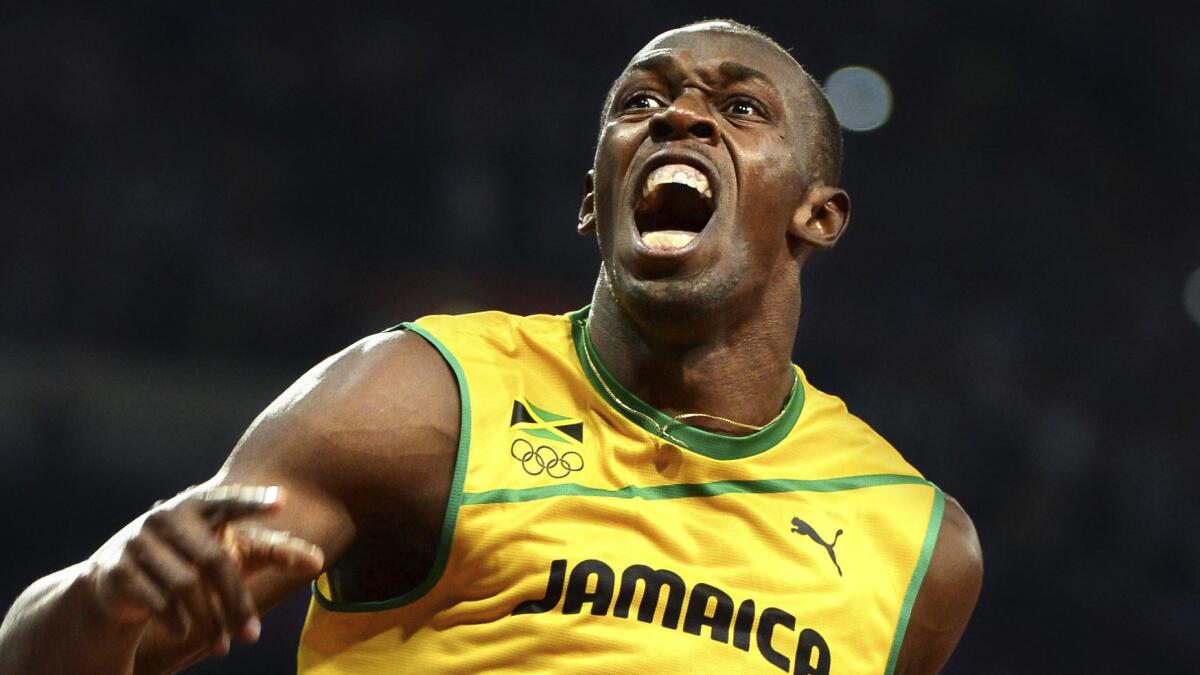 Jamaica's Usain Bolt celebrates after winning the gold medal in the men's 200 meters at the 2012 London Olympic Games.