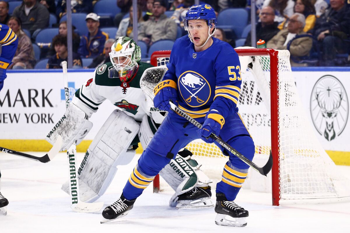 Buffalo Sabres left wing Jeff Skinner (53) skates in front of Minnesota Wild goaltender Kaapo Kahkonen (34) during the first period of an NHL hockey game, Friday, March 4, 2022, in Buffalo, N.Y. (AP Photo/Jeffrey T. Barnes)