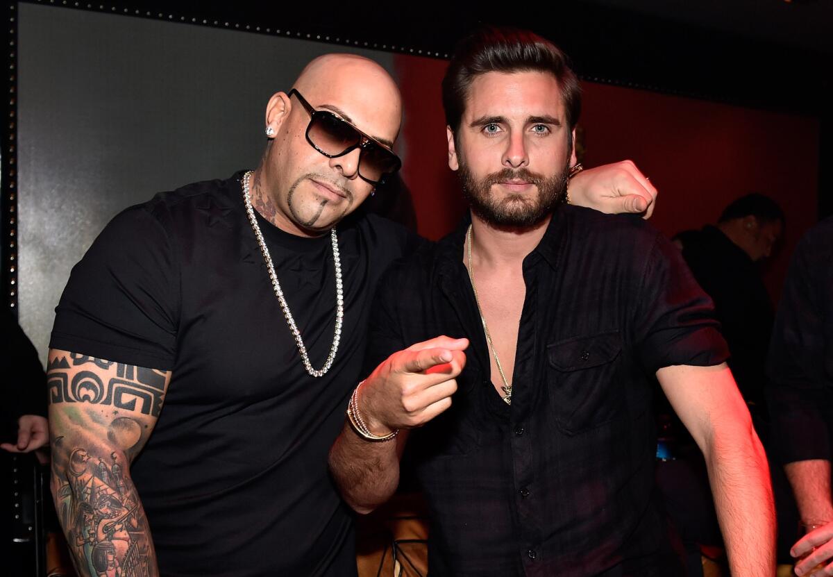 Rapper Mally Mall (left) and television personality Scott Disick appear at 1 OAK Nightclub at the Mirage.