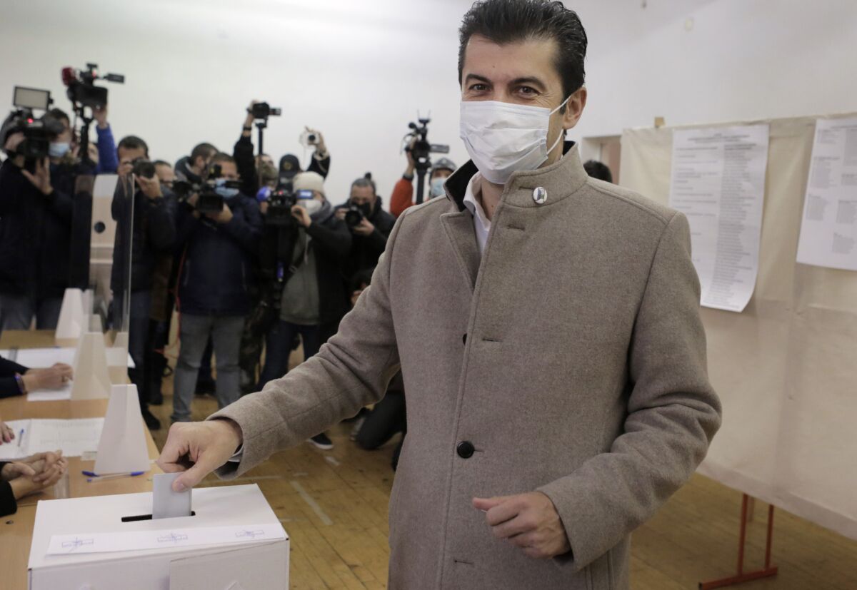Kiril Petkov, leader of We Continue the Change party, casts his ballot in Sofia, Sunday, Nov. 14, 2021. Bulgarians are heading to the polls to elect a new parliament and a new president amid a surge of coronavirus infections. Some 6.7 million eligible voters hope that after inconclusive general elections in April and July, the third attempt to elect 240 lawmakers will result in a government to lead the European Union’s poorest member out of health and economic crises. (AP Photo/Valentina Petrova)